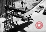 Standbild P-47 Thunderbolts geladen auf Flugzeugträger Ford Island Pearl Harbor Hawaii USA, 1944, aus Sekunde 50 historischem Filmmaterial Videoclip 65675047534
