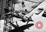 Standbild P-47 Thunderbolts geladen auf Flugzeugträger Ford Island Pearl Harbor Hawaii USA, 1944, aus Sekunde 51 historischem Filmmaterial Videoclip 65675047534