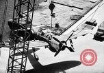Standbild P-47 Thunderbolts geladen auf Flugzeugträger Ford Island Pearl Harbor Hawaii USA, 1944, aus Sekunde 53 historischem Filmmaterial Videoclip 65675047534