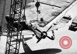 Standbild P-47 Thunderbolts geladen auf Flugzeugträger Ford Island Pearl Harbor Hawaii USA, 1944, aus Sekunde 54 historischem Filmmaterial Videoclip 65675047534