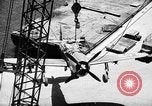 Standbild P-47 Thunderbolts geladen auf Flugzeugträger Ford Island Pearl Harbor Hawaii USA, 1944, aus Sekunde 55 historischem Filmmaterial Videoclip 65675047534
