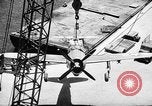 Standbild P-47 Thunderbolts geladen auf Flugzeugträger Ford Island Pearl Harbor Hawaii USA, 1944, aus Sekunde 56 historischem Filmmaterial Videoclip 65675047534