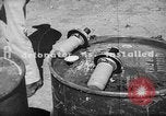 Standbild improvisierten napalm Bomben auf P-47 Flugzeuge Aslito Flugplatz Saipan Marianen, 1944, aus Sekunde 58 historischem Filmmaterial Videoclip 65675047545