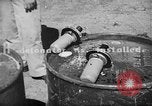 Standbild improvisierten napalm Bomben auf P-47 Flugzeuge Aslito Flugplatz Saipan Marianen, 1944, aus Sekunde 59 historischem Filmmaterial Videoclip 65675047545