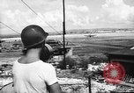 Standbild 19 USAAF Fighter Squadron P-47s der gegnerischen Insel Tinian Insel Tinian Marianen, 1945, aus Sekunde 9 historischem Filmmaterial Videoclip 65675047547