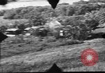 Standbild P-47s 19 Fighter Squadron Angriff japanische Stellungen Insel Tinian Marianen, 1944, aus Sekunde 27 historischem Filmmaterial Videoclip 65675047548
