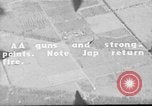 Standbild P-47s 19 Fighter Squadron Angriff japanische Stellungen Insel Tinian Marianen, 1944, aus Sekunde 31 historischem Filmmaterial Videoclip 65675047548