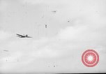 Standbild P-47s 19 Fighter Squadron Angriff japanische Stellungen Insel Tinian Marianen, 1944, aus Sekunde 37 historischem Filmmaterial Videoclip 65675047548