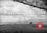 Image of U.S. P-47s striking Japanese positions on Tinian Tinian Island Mariana Islands, 1944, second 1 stock footage video 65675047550