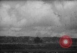 Image of U.S. P-47s striking Japanese positions on Tinian Tinian Island Mariana Islands, 1944, second 15 stock footage video 65675047550