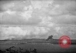 Image of U.S. P-47s striking Japanese positions on Tinian Tinian Island Mariana Islands, 1944, second 19 stock footage video 65675047550