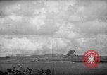 Image of U.S. P-47s striking Japanese positions on Tinian Tinian Island Mariana Islands, 1944, second 20 stock footage video 65675047550