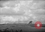 Image of U.S. P-47s striking Japanese positions on Tinian Tinian Island Mariana Islands, 1944, second 23 stock footage video 65675047550