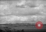 Image of U.S. P-47s striking Japanese positions on Tinian Tinian Island Mariana Islands, 1944, second 25 stock footage video 65675047550