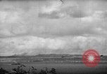 Image of U.S. P-47s striking Japanese positions on Tinian Tinian Island Mariana Islands, 1944, second 28 stock footage video 65675047550
