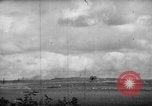Image of U.S. P-47s striking Japanese positions on Tinian Tinian Island Mariana Islands, 1944, second 32 stock footage video 65675047550
