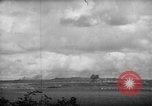 Image of U.S. P-47s striking Japanese positions on Tinian Tinian Island Mariana Islands, 1944, second 34 stock footage video 65675047550