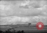 Image of U.S. P-47s striking Japanese positions on Tinian Tinian Island Mariana Islands, 1944, second 36 stock footage video 65675047550