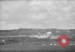 Image of U.S. P-47s striking Japanese positions on Tinian Tinian Island Mariana Islands, 1944, second 42 stock footage video 65675047550