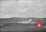 Image of U.S. P-47s striking Japanese positions on Tinian Tinian Island Mariana Islands, 1944, second 43 stock footage video 65675047550