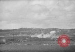 Image of U.S. P-47s striking Japanese positions on Tinian Tinian Island Mariana Islands, 1944, second 45 stock footage video 65675047550