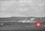 Image of U.S. P-47s striking Japanese positions on Tinian Tinian Island Mariana Islands, 1944, second 47 stock footage video 65675047550