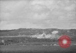 Image of U.S. P-47s striking Japanese positions on Tinian Tinian Island Mariana Islands, 1944, second 48 stock footage video 65675047550