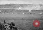 Image of U.S. P-47s striking Japanese positions on Tinian Tinian Island Mariana Islands, 1944, second 54 stock footage video 65675047550