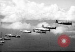 Standbild P-47s von 318 Fighter Group Rückkehr von Tinian raid Aslito Flugplatz Saipan Marianen, 1944, aus Sekunde 11 historischem Filmmaterial Videoclip 65675047552