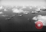 Standbild P-47s von 318 Fighter Group Rückkehr von Tinian raid Aslito Flugplatz Saipan Marianen, 1944, aus Sekunde 24 historischem Filmmaterial Videoclip 65675047552