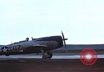 Immagine di Le scintille volano come P-47 terre con pneumatico destro mancante Belgio, 1945, secondo 50 filmato di repertorio 65675047577