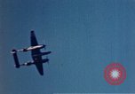 Image of P-38 and P-47 aircraft peel off  and a P-47 lands Belgium, 1945, second 4 stock footage video 65675047648