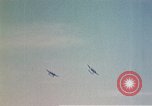 Image of P-38 and P-47 aircraft peel off  and a P-47 lands Belgium, 1945, second 6 stock footage video 65675047648