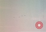 Image of P-38 and P-47 aircraft peel off  and a P-47 lands Belgium, 1945, second 13 stock footage video 65675047648