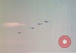 Image of P-38 and P-47 aircraft peel off  and a P-47 lands Belgium, 1945, second 16 stock footage video 65675047648