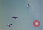 Image of P-38 and P-47 aircraft peel off  and a P-47 lands Belgium, 1945, second 18 stock footage video 65675047648