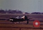 Image of P-38 and P-47 aircraft peel off  and a P-47 lands Belgium, 1945, second 24 stock footage video 65675047648