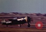 Image of P-38 and P-47 aircraft peel off  and a P-47 lands Belgium, 1945, second 26 stock footage video 65675047648