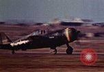 Image of P-38 and P-47 aircraft peel off  and a P-47 lands Belgium, 1945, second 27 stock footage video 65675047648