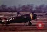 Image of P-38 and P-47 aircraft peel off  and a P-47 lands Belgium, 1945, second 28 stock footage video 65675047648
