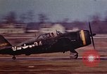 Image of P-38 and P-47 aircraft peel off  and a P-47 lands Belgium, 1945, second 29 stock footage video 65675047648
