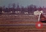 Image of P-38 and P-47 aircraft peel off  and a P-47 lands Belgium, 1945, second 30 stock footage video 65675047648