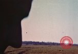 Image of P-38 and P-47 aircraft peel off  and a P-47 lands Belgium, 1945, second 32 stock footage video 65675047648