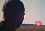 Image of P-38 and P-47 aircraft peel off  and a P-47 lands Belgium, 1945, second 33 stock footage video 65675047648
