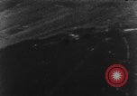 Image of Messerschmitt Bf 110 fighter plane struck by gunfire from an American P-51 aircraft European Theater, 1944, second 6 stock footage video 65675047652