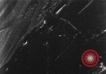 Image of Messerschmitt Bf 110 fighter plane struck by gunfire from an American P-51 aircraft European Theater, 1944, second 8 stock footage video 65675047652