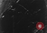Image of Messerschmitt Bf 110 fighter plane struck by gunfire from an American P-51 aircraft European Theater, 1944, second 9 stock footage video 65675047652