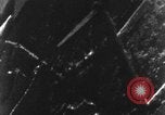 Image of Messerschmitt Bf 110 fighter plane struck by gunfire from an American P-51 aircraft European Theater, 1944, second 12 stock footage video 65675047652
