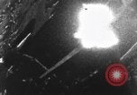 Image of Messerschmitt Bf 110 fighter plane struck by gunfire from an American P-51 aircraft European Theater, 1944, second 13 stock footage video 65675047652