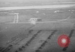 Image of strafing parked truck and stationary vehicles European Theater, 1944, second 6 stock footage video 65675047712